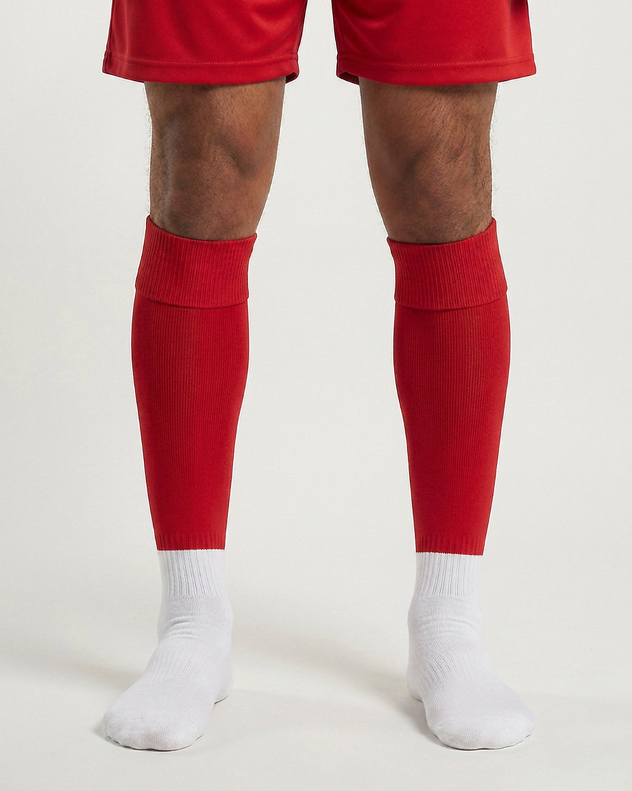 Farrellys World football sock sleeve worn over a white crew sock - Red