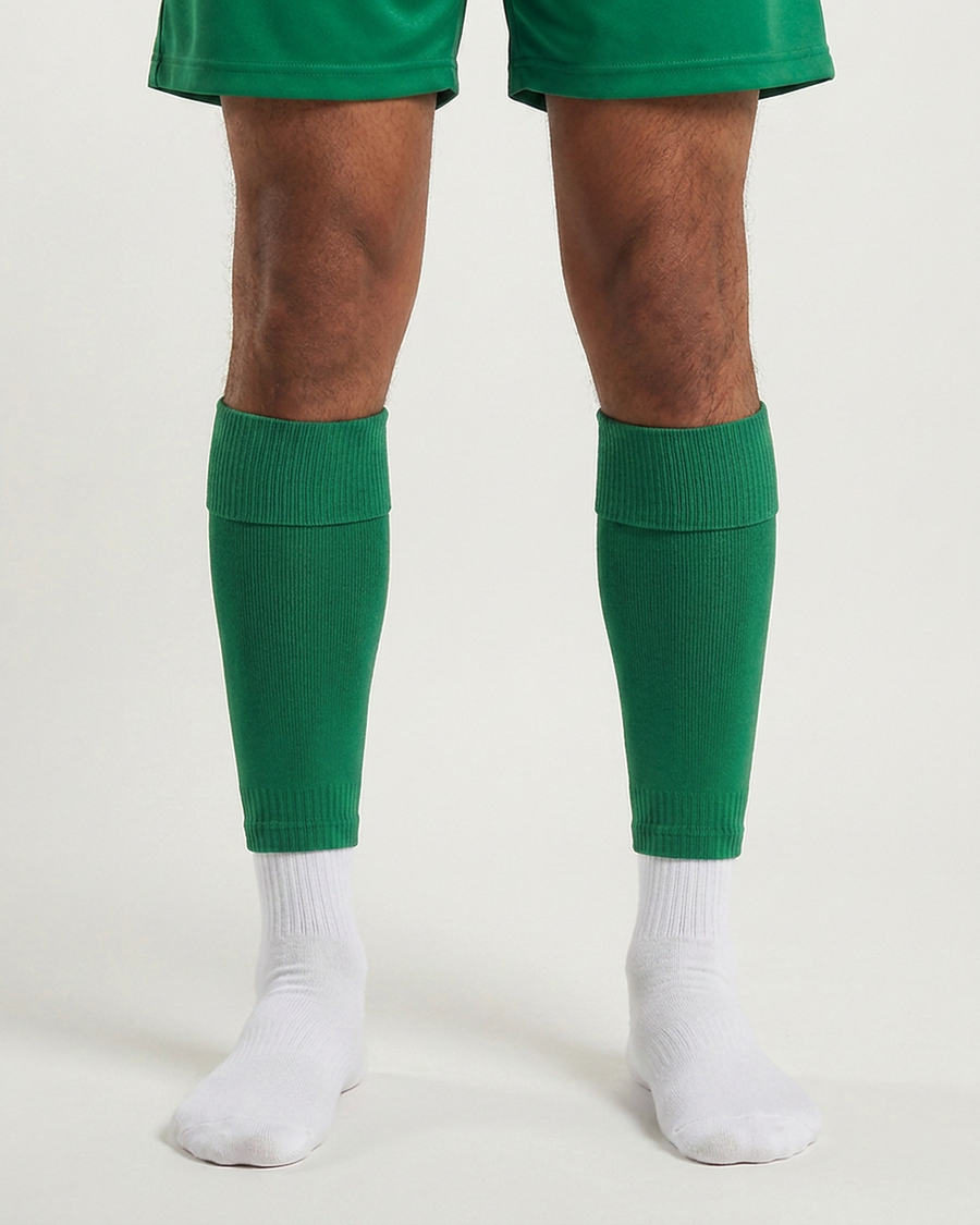 Farrellys World football sock sleeve worn over a white crew sock - Irish Green
