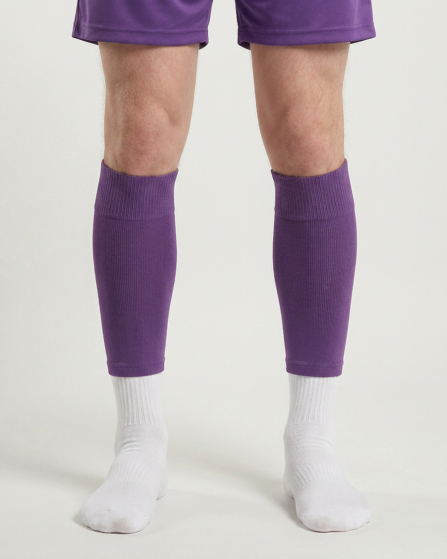 Farrellys World football sock sleeve worn over a white crew sock - Purple