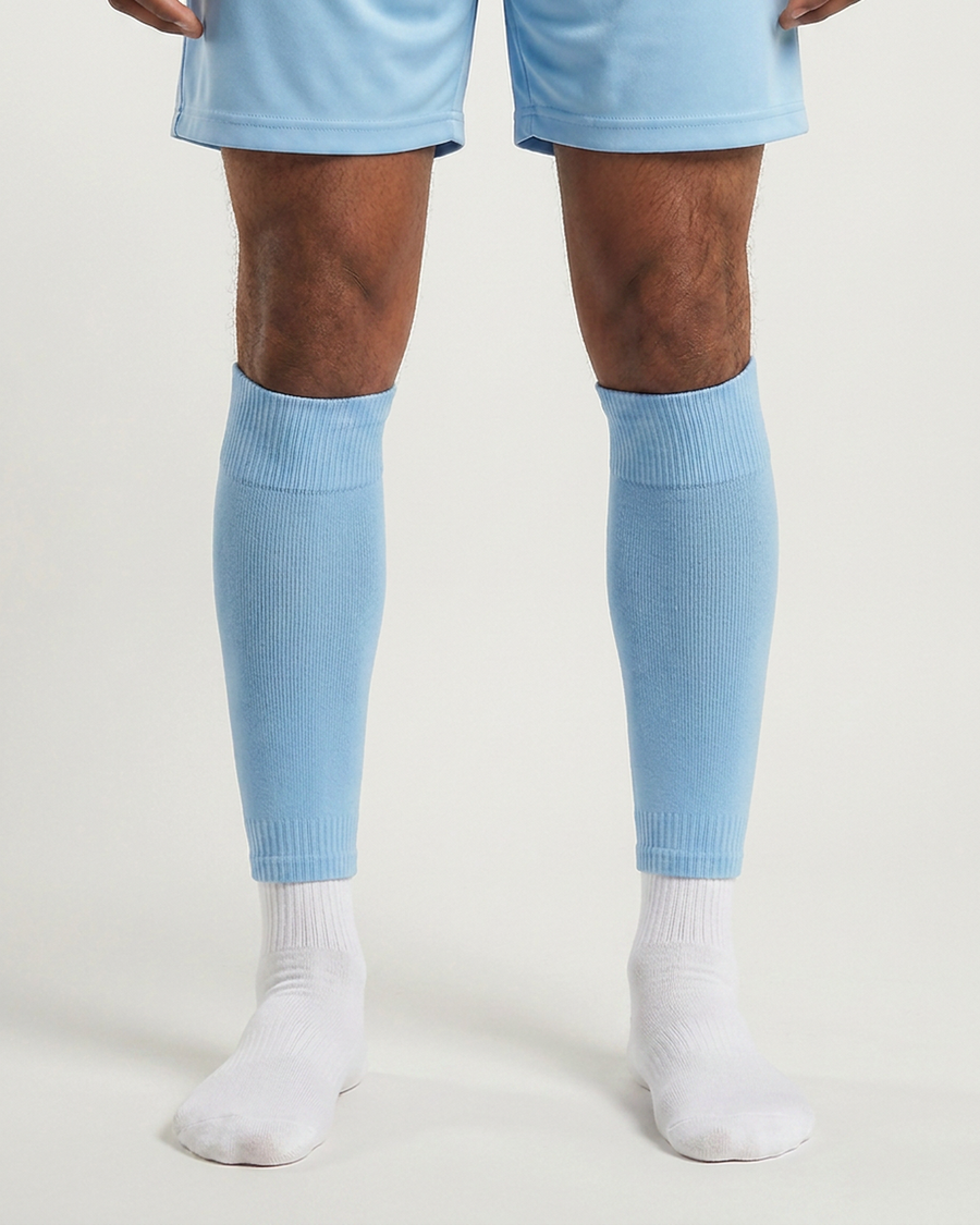 Farrellys World football sock sleeve worn over a white crew sock - Sky Blue